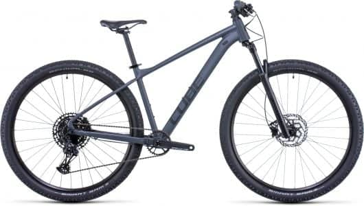 Modern Cube Acid mountain bike in gray with dual disc brakes and black tires, on a white background.