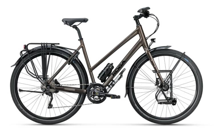 Brown KOGA Traveller touring bicycle with rear rack, fenders, and hydraulic disc brakes.