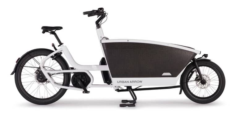 Black Urban Arrow electric cargo bike with front cargo box and rear wheel storage on a white background.