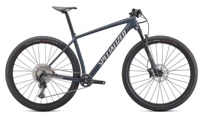 Specialized Epic Hardtail mountain bike in blue with sleek frame and off-road tires.