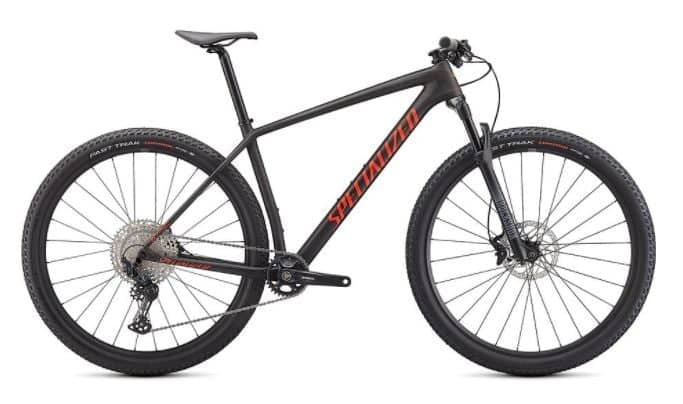Specialized Epic Hardtail mountain bike in blue with sleek frame and off-road tires.